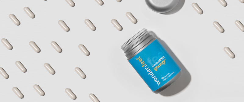 How Youngr NMN manufactured capsules look on a table, white and pure