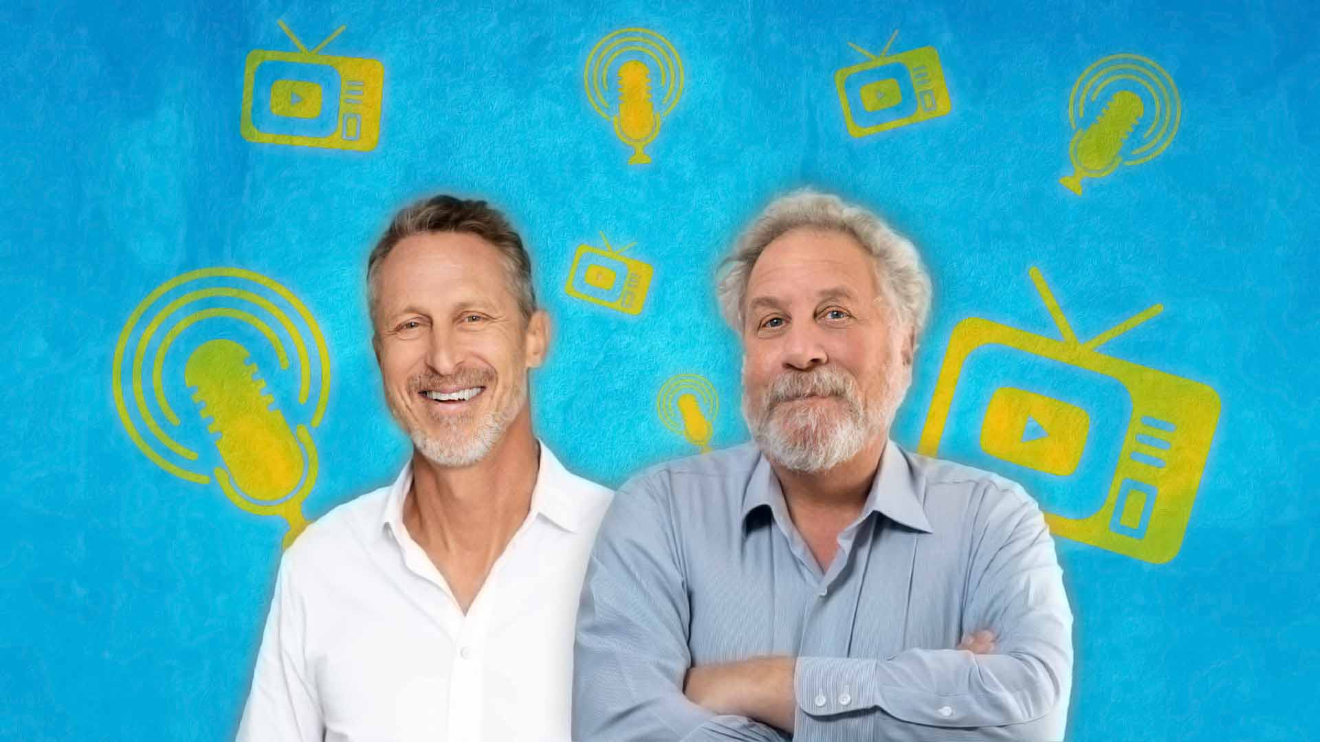Dr. Mark Hyman and Professor Andrew Salzman stand smiling in front of a blue background